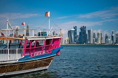 Pink, white and blue boat
